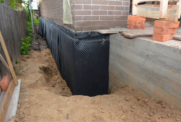SJ Waterproofing Pros technician performing targeted Foundation Crack Repair assessment in Cicero, IN